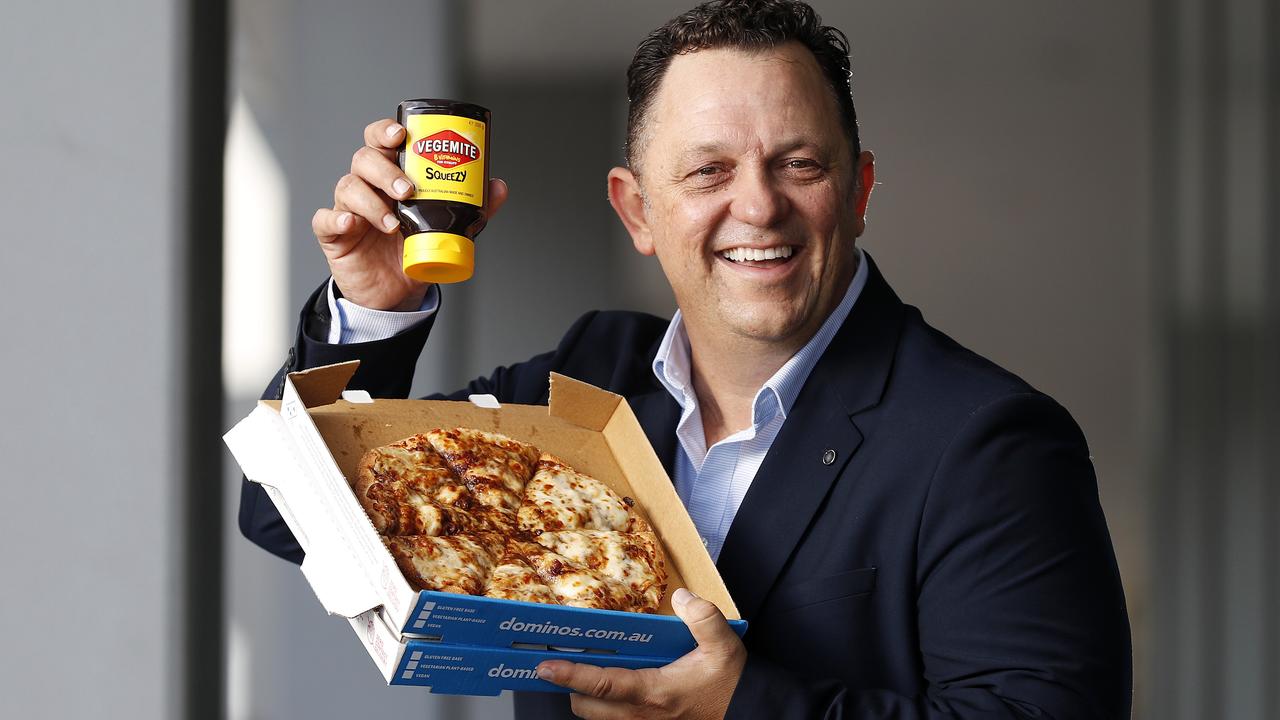 Dominos Australia and New Zealand chief executive David Burness with the Cheesy Vegemite pizza launched last month. Picture: Josh Woning