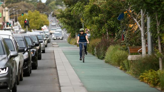 A cyclist riding along the Green Spine oni Malop St Geelong bike lane. Picture: Alison Wynd