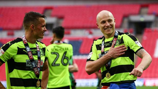 Aaron Mooy celebrates Huddersfield's Premier League promotion