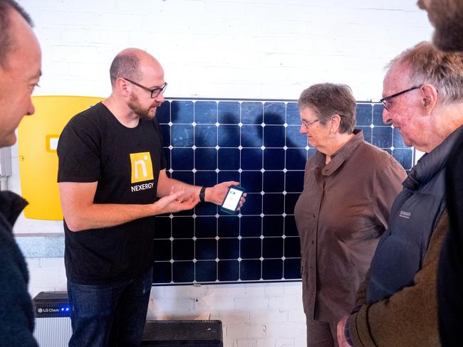 Grant Young explains how the Nexergy app and system work. Picture: Marty Walker.