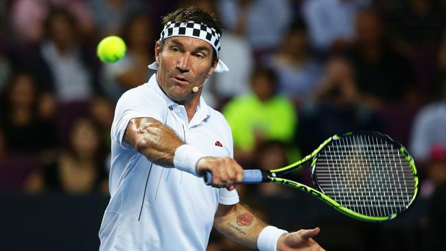 Australia's Pat Cash was accused of wearing his ‘headband too tight’ after sharing a COVID conspiracy post on Twitter. Picture: Brett Costello