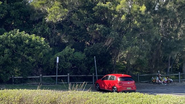 The car park at Park Beach, Coffs Harbour, with the tributes to the right. Picture: Janine Watson/Coffs Coast Advocate