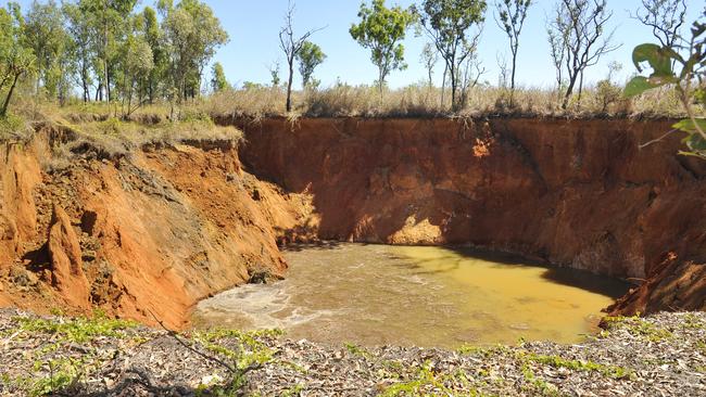 The huge sinkhole in Lance Hart’s backyard.