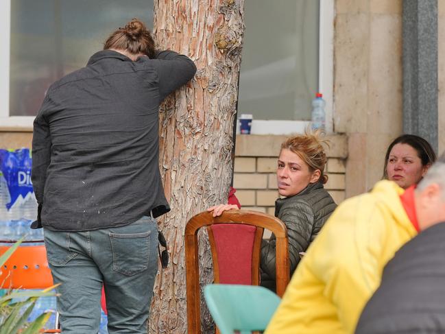 Relatives of the victims wait for news outside Kocani General Hospital, North Macedonia. At least 59 people have died after a fire broke out overnight at the Pulse Club. Picture: Ferdi Limani/Getty Images