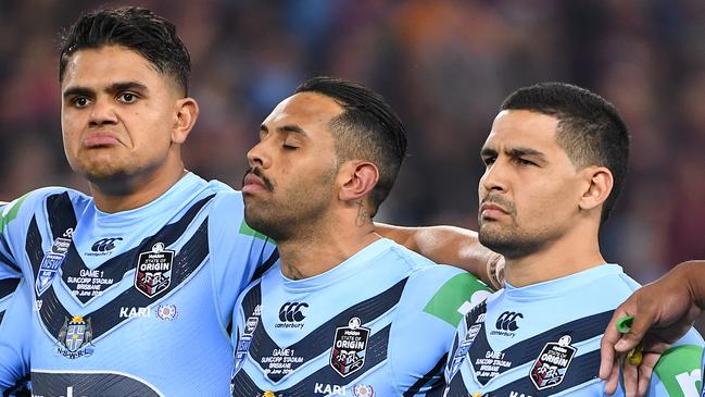 Latrell Mitchell, Josh Addo-Carr and Cody Walker during the national anthem.