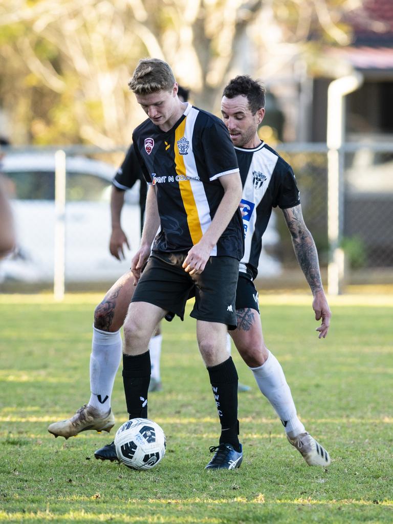 Noah Cochran (left) of West Wanderers and Trent Ingleton of Willowburn in FQPL Men Darling Downs Presidents Cup football at West Wanderers, Sunday, July 24, 2022. Picture: Kevin Farmer