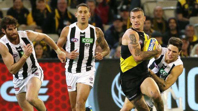 Dustin Martin bursts out of defence during 2017 against Collingwood. Picture: George Salpigtidis