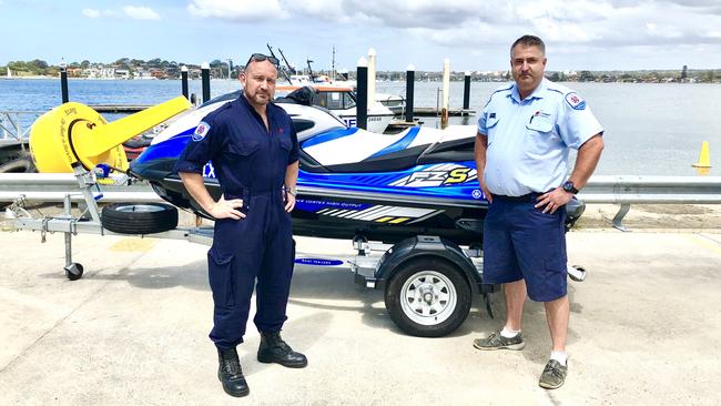 Roads and Maritime Services maritime executive director Angus Mitchell (left) with a jetski seized after a separate incident in the Georges River in October Picture: Eliza Barr