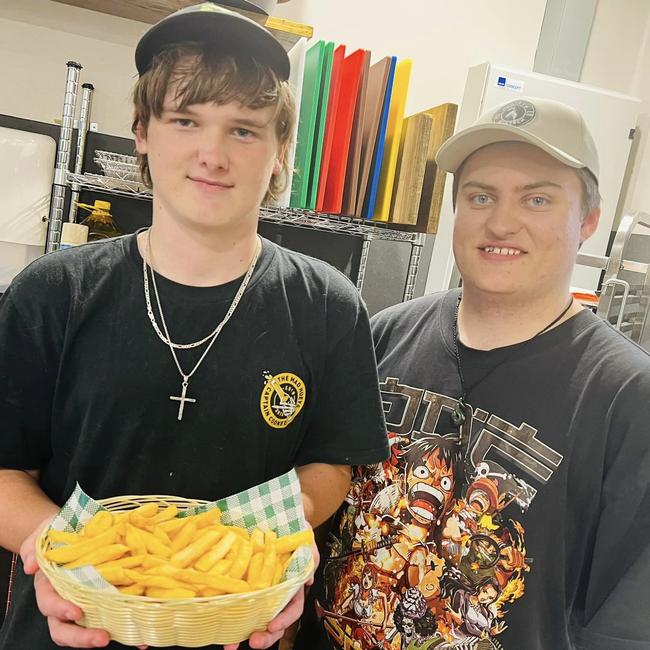 Territory True participant Bailey Briggs, who cooked the inaugural basket of fries, with Territory True Cafe manager Tom McMaster. Picture: Facebook