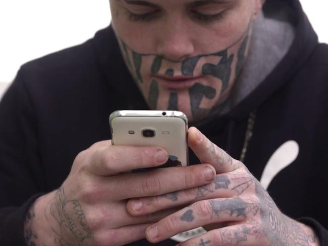 The young father also has tattoos on his hands and arms. Picture: NZ Herald