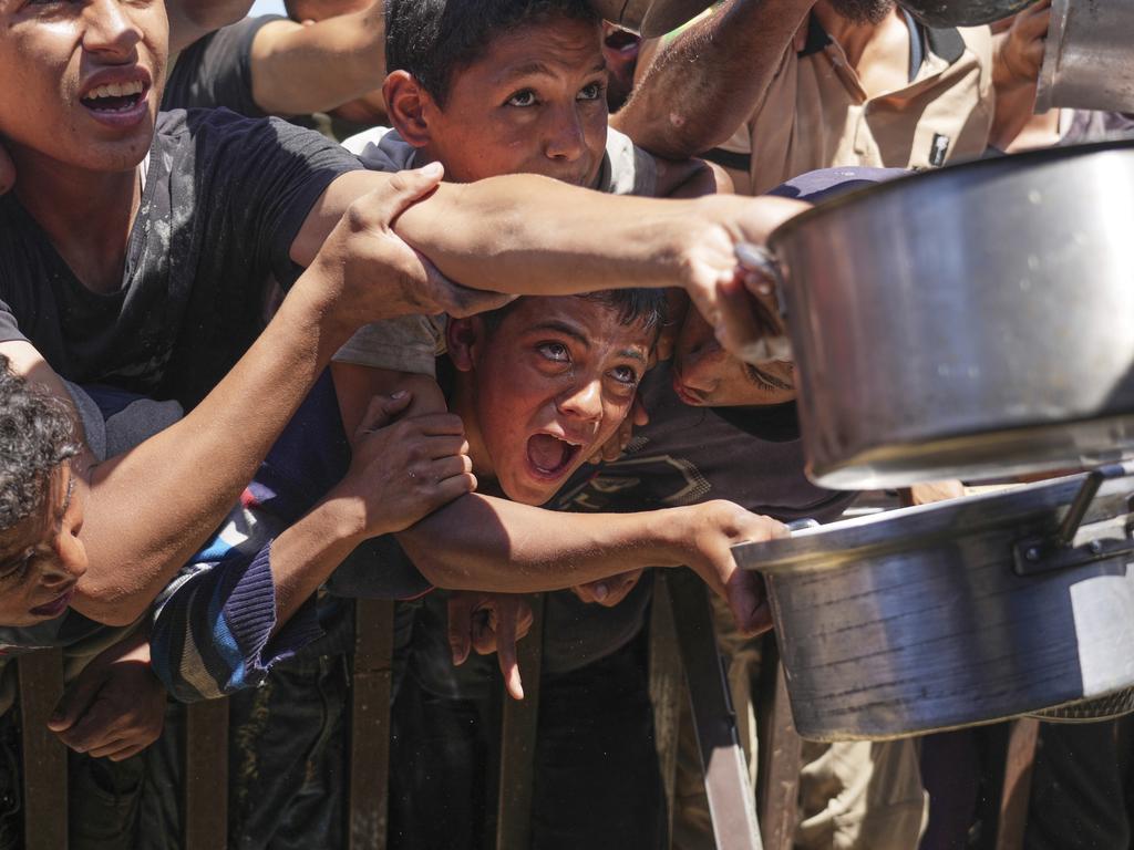 Strikes reportedly kill 60 as Israel lets in ‘teaspoon’ of aid
