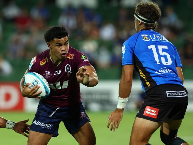 PERTH, AUSTRALIA - MARCH 04: Hunter Paisami of the Reds runs the ball during the round three Super Rugby Pacific match between the Western Force and the Queensland Reds at HBF Park on March 04, 2022 in Perth, Australia. (Photo by Paul Kane/Getty Images)