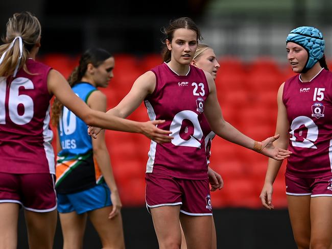 Rania Crozier of Queensland celebrates with teammates after kicking a goal during the AFL National Championships (Photo by Albert Perez/AFL Photos via Getty Images)