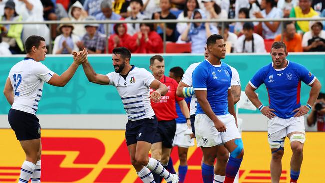 HIGASHIOSAKA, JAPAN - SEPTEMBER 22: Tito Tebaldi of Italy celebrates scoring his side's second try with his team mate Luca Morisi during the Rugby World Cup 2019 Group B game between Italy and Namibia at Hanazono Rugby Stadium on September 22, 2019 in Higashiosaka, Osaka, Japan. (Photo by Ken Ishii/Getty Images)