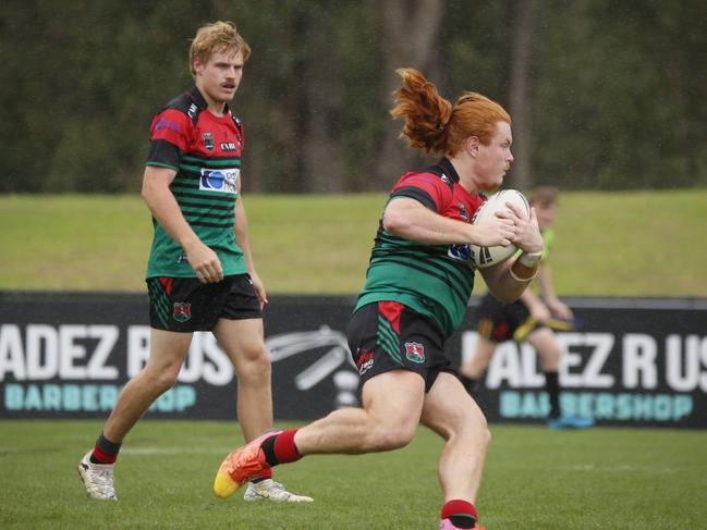 Keegan McGrann heads up the field. Picture Warren Gannon Photography