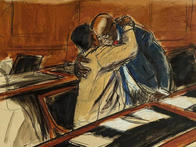 A courtroom sketch shows Sean Combs (left) hugging his attorney Anthony Ricco upon entering the hearing in Federal court in New York on 10 October. Picture: Elizabeth Williams / AP