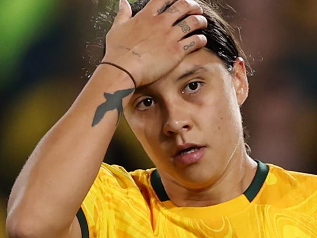 SYDNEY, AUSTRALIA - AUGUST 16: Sam Kerr of Australia reacts after England's second goal  during the FIFA Women's World Cup Australia & New Zealand 2023 Semi Final match between Australia and England at Stadium Australia on August 16, 2023 in Sydney, Australia. (Photo by Alex Pantling - FIFA/FIFA via Getty Images)