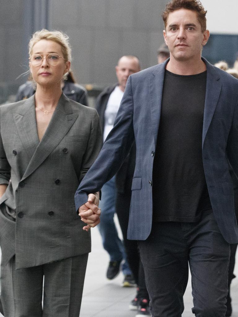 Asher Keddie and her husband Vincent Fantauzzo arrive at Rod Laver Arena for the State Memorial service for music industry icon Michael Gudinski. Picture: David Geraghty