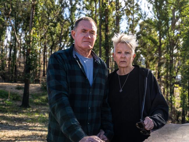 Denis and Bev Wallis are still living in a caravan on their property because they cannot rebuild without jumping through hoops. Picture: Josh Burkinshaw