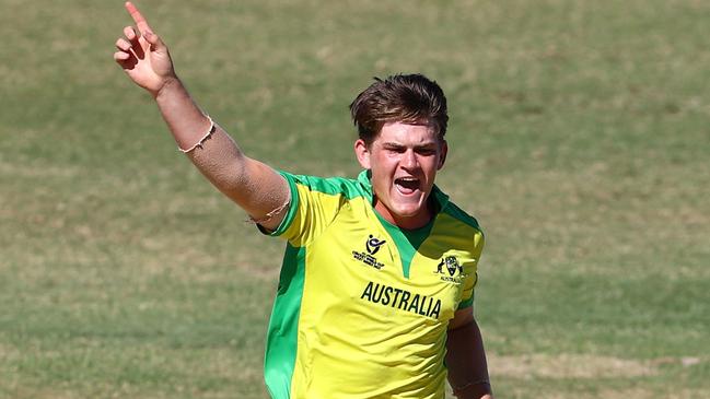 Aidan Cahill of Australia celebrates the wicket of Abdul Faseeh