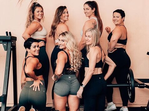 Jess Zukowski (centre, bottom row), the owner of The Booty Parlour, a boutique strength studio for women in her new premises at Newport. Picture: Supplied