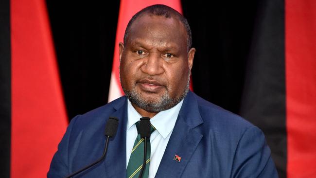 Papua New Guinea Prime Minister James Marape speaks to reporters. Picture: AFP.