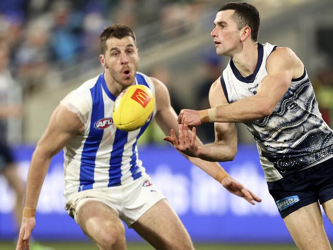 Mark O'Connor hands one off. Picture: Martin Keep/AFL Photos via Getty Images