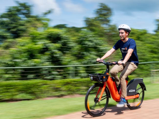 Neuron Mobility are launching a new product in Darwin. E-bikes will be available via the same system and app as their already popular e-scooters. Richard Hannah, Regional Manager at Neuron Mobility takes one of the new bikes for a spin. Picture: Che Chorley