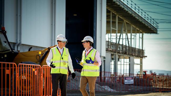 Naval Group global chief executive Pierre Eric Pommellet speaking with Finance Minister Simon Birmingham at Osborne shipyard. Picture: Mike Burton