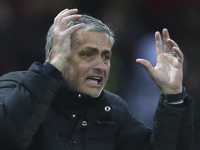 Manchester United manager Jose Mourinho gestures during the Premier League soccer match between Manchester United and Tottenham Hotspur at Old Trafford in Manchester, England, Sunday, Dec. 11, 2016. (AP Photo/Dave Thompson)