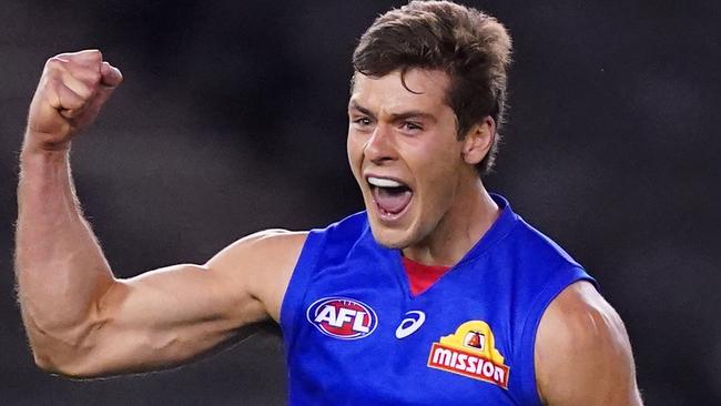 Josh Dunkley of the Bulldogs celebrates after kicking a goal during the Round 3 AFL match between Western Bulldogs and GWS Giants at Marvel Stadium in Melbourne, Friday, June 19, 2020. (AAP Image/Scott Barbour) NO ARCHIVING, EDITORIAL USE ONLY