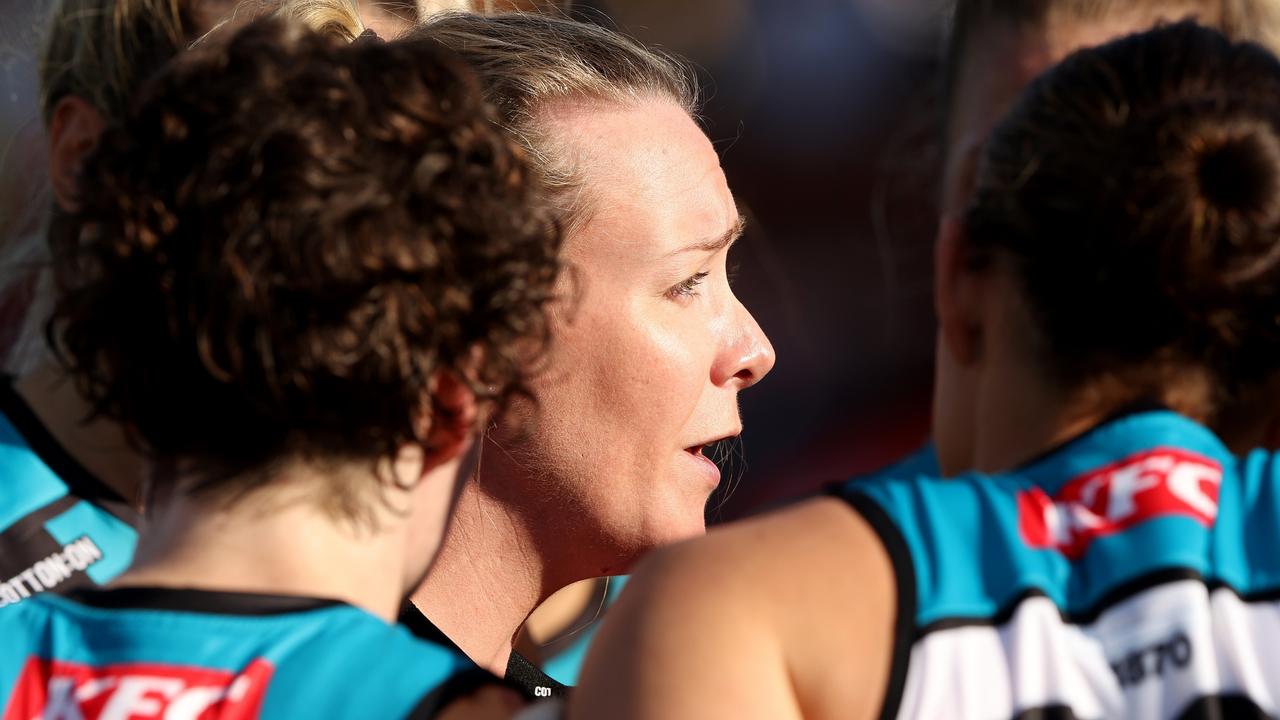 Arnell delivering a message to her players during the season opener against the Crows. Picture: Sarah Reed/AFL Photos