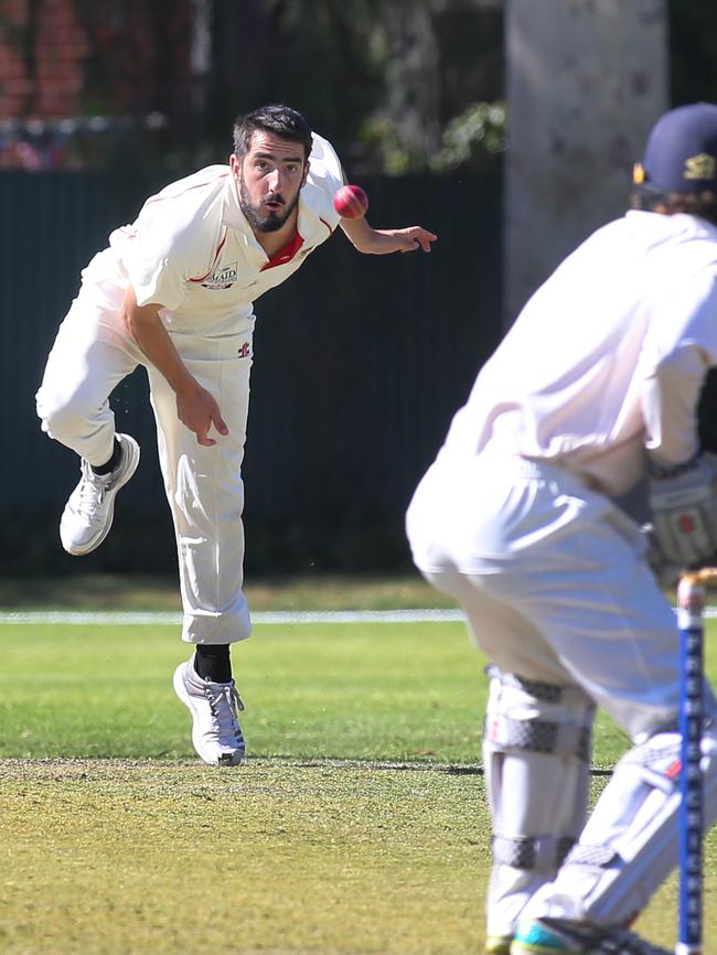 Adelaide’s Cameron Valente fires one down to Sturt's Tom Kelly. Picture: AAP/Dean Martin