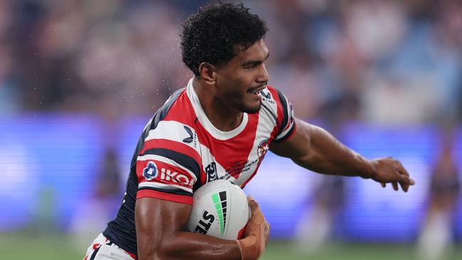 SYDNEY, AUSTRALIA - MARCH 06: Robert Toia of the Roosters makes a break during the round one NRL match between Sydney Roosters and Brisbane Broncos at Allianz Stadium, on March 06, 2025, in Sydney, Australia. (Photo by Matt King/Getty Images)