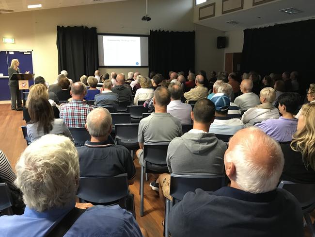 A large crowd gathered for public meeting at Copacabana Surf Club.