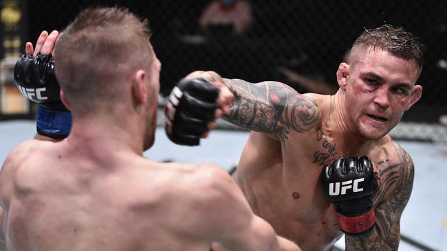 Dustin Poirier punches Hooker during their thrilling lightweight fight in Las Vegas last year.