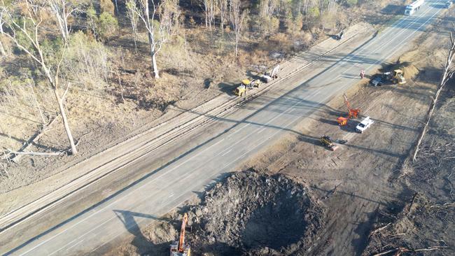 Recovery works taking place on the Bruce Highway where an ammonium nitrate truck exploded near Bororen. Photo - TMR