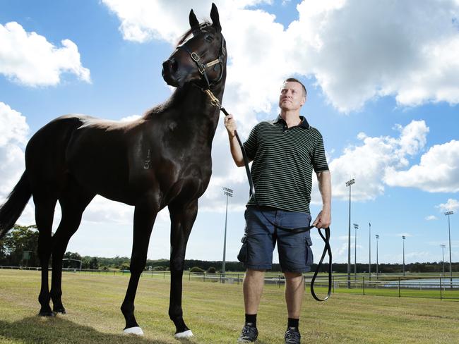 Trainer David Van Dyke with his stable star Yankee Rose. Picture: Lachie Millard