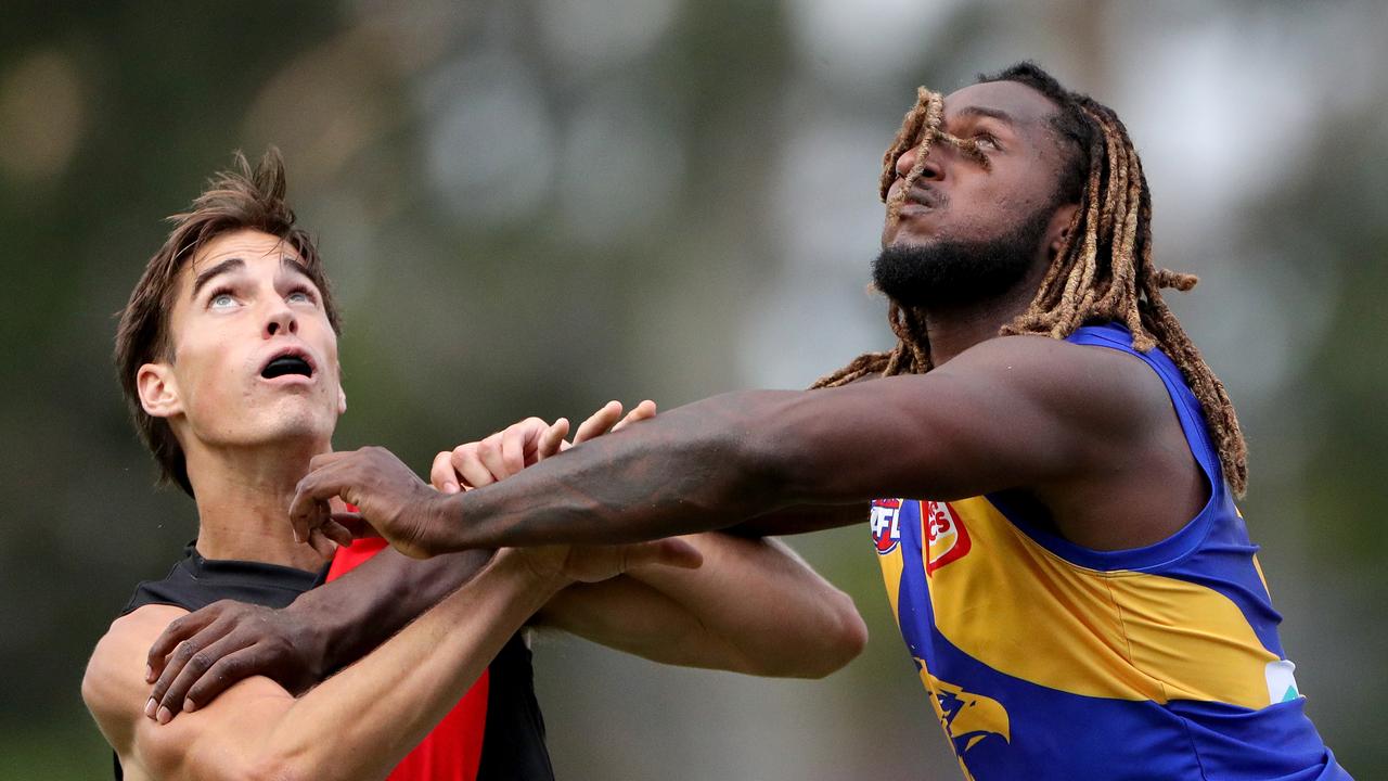 Brynn Teakle rucks against Nic Naitanui during the AFL Community Series pre-season match match in 2020. Picture: AAP Image/Richard Wainwright