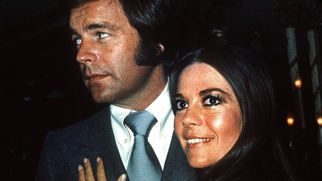 FILE - In this 1980 file photo, actor Robert Wagner appears with actress Natalie Wood. Los Angeles sheriff's homicide detectives are taking another look at Wood's 1981 drowning death based on new information, officials announced Thursday, Nov. 17, 2011. A yacht captain said on national TV Friday, Nov. 18, 2011, that he lied to investigators about Natalie Wood's mysterious death 30 years ago and blames the actress' husband at the time, Wagner, for her drowning in the ocean off Southern California. (AP Photo, File)