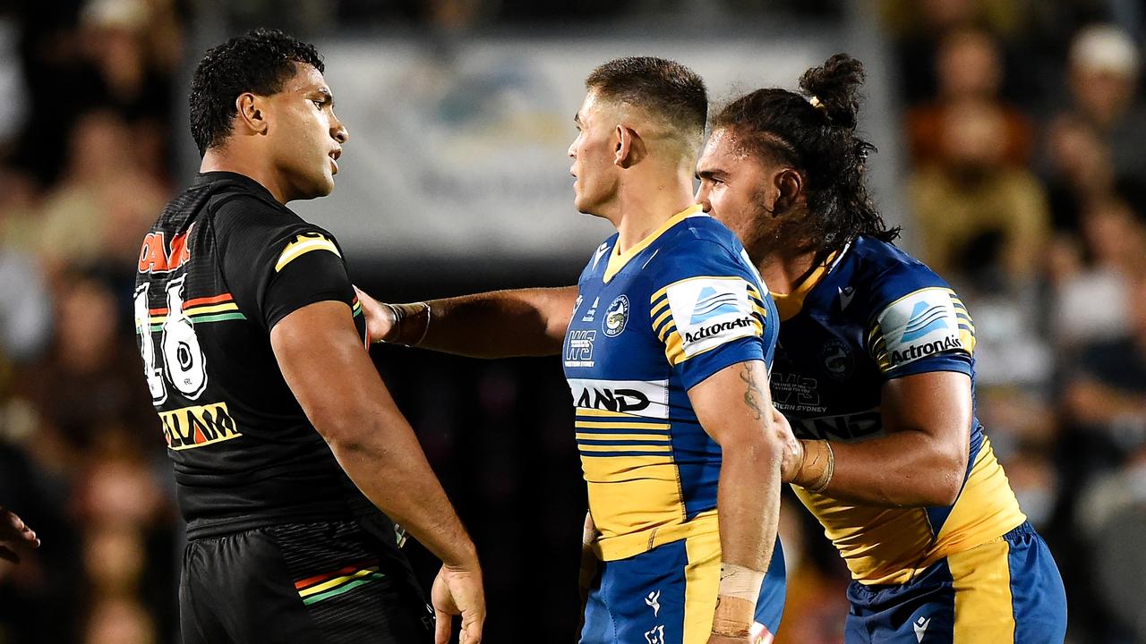 MACKAY, AUSTRALIA – SEPTEMBER 18: Tevita Pangai Junior of the Panthers exchanges heated words with Will Smith and Isaiah Papali'i of the Eels during the NRL semi-final match between the Penrith Panthers and the Parramatta Eels at BB Print Stadium on September 18, 2021 in Mackay, Australia. (Photo by Matt Roberts/Getty Images)