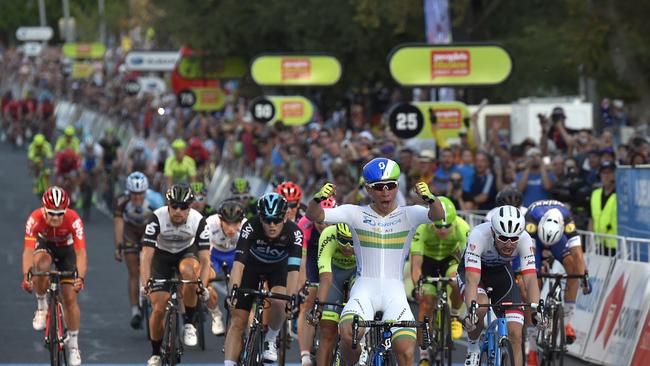 Caleb Ewan from the Orica Greenedge team (2nd R) wins the People's Choice Classic cycling race ahead of the Tour Down Under in Adelaide on January 17, 2016. Australian riders look set to dominate the season-opening UCI World Tour race when the 2016 Tour Down Under begins in South Australia on January 19. AFP PHOTO / DAVID MARIUZ IMAGE STRICTLY FOR EDITORIAL USE - STRICTLY NO COMMERCIAL USE