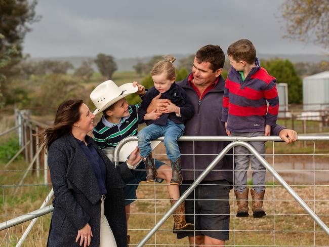 Kirsty Evans is a commercial property lawyer at Cheney Suthers Lawyers, pictured with husband Tom Evans, and children Sonny, Edie and Henry. Picture: Kim Storey