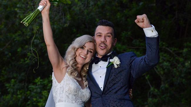 Jessabeau Thompson and David Baldino after tying the knot at the Adelaide Botanic Gardens, which stayed open 30 minutes later so they could get married with close friends and family. Picture: Brenton Edwards