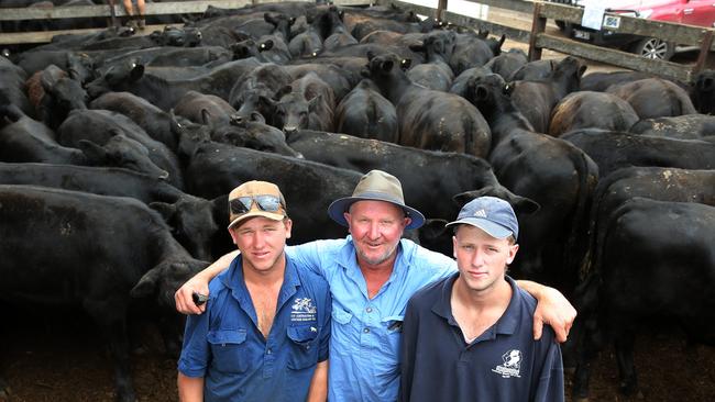 Vendor Brett Linke with his sons Jackson and Oscar from Mt Napier/ Picture: Yuri Kouzmin