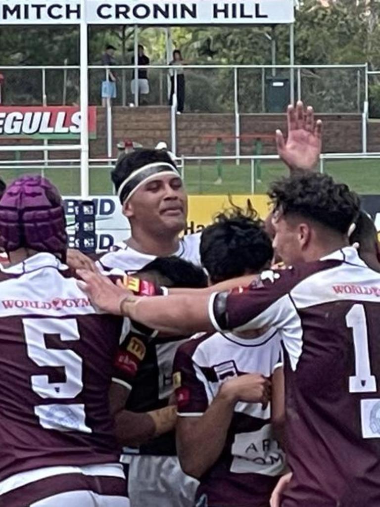 Arama Hau, waving, will captain Keebra Park SHS.