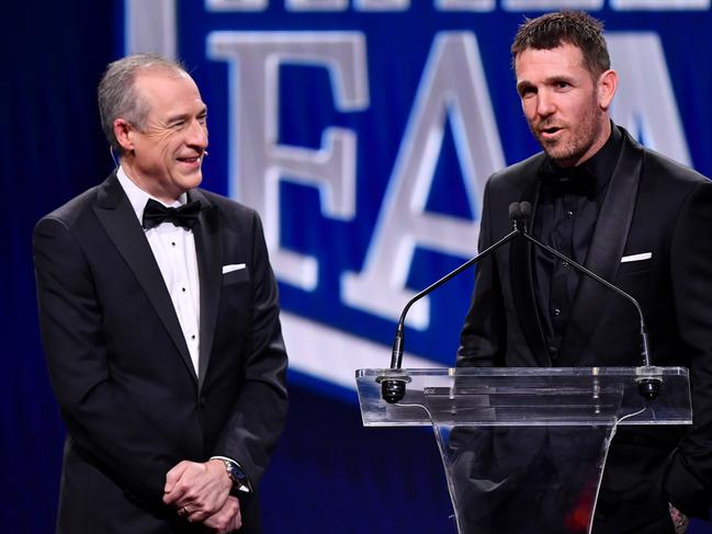 Dane Swan and Gerard Whateley. Picture: Josh Chadwick/AFL Photos/via Getty Images