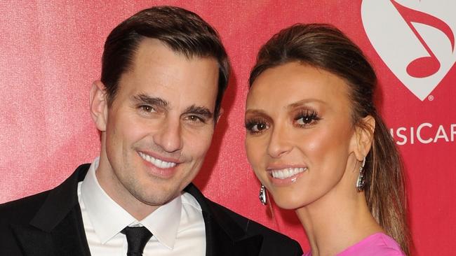 23/04/2012 WIRE: LOS ANGELES, CA - FILE: Tv personality Giuliana Rancic (R) and Bill Rancic arrive at the 2012 MusiCares Person of the Year Tribute to Paul McCartney held at the Los Angeles Convention Center on February 10, 2012 in Los Angeles, California. According to reports April 23, 2012 Giuliana Rancic and Bill Rancic are expecting a baby via a surrogate. (Photo by Jason Merritt/Getty Images) Pic. Images Getty