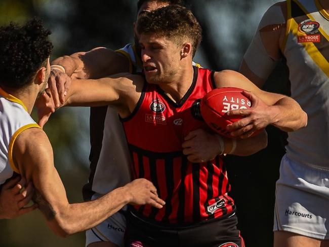 Sam Parks tries to break a tackle. Picture: Field of View Photography