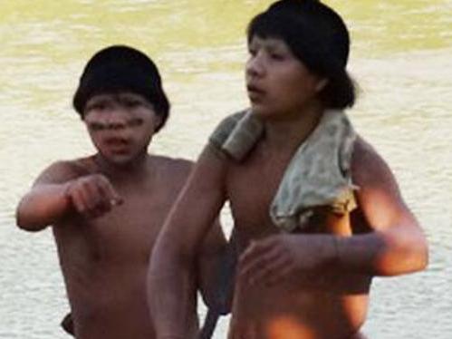 Members of an isolated indigenous tribe from the Amazon seek help from a settled community of villagers in Acre, Brazil Picture: Funai — Brazil